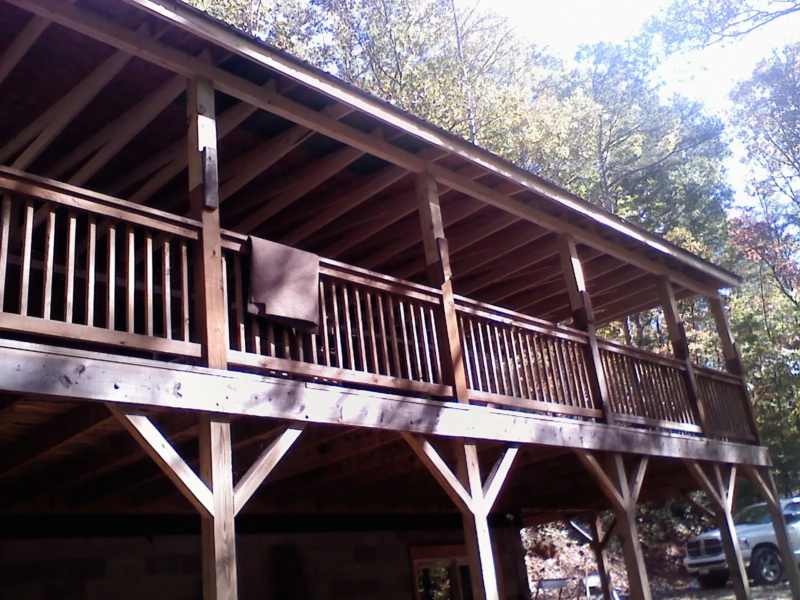 Timber framing under a new elevated porch and deck — Roof Leak Repair in Newell by Roofing Brothers